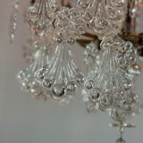 Bronze cage chandelier adorned with molded glass pendants in the shape of peacock feathers, circa 1800