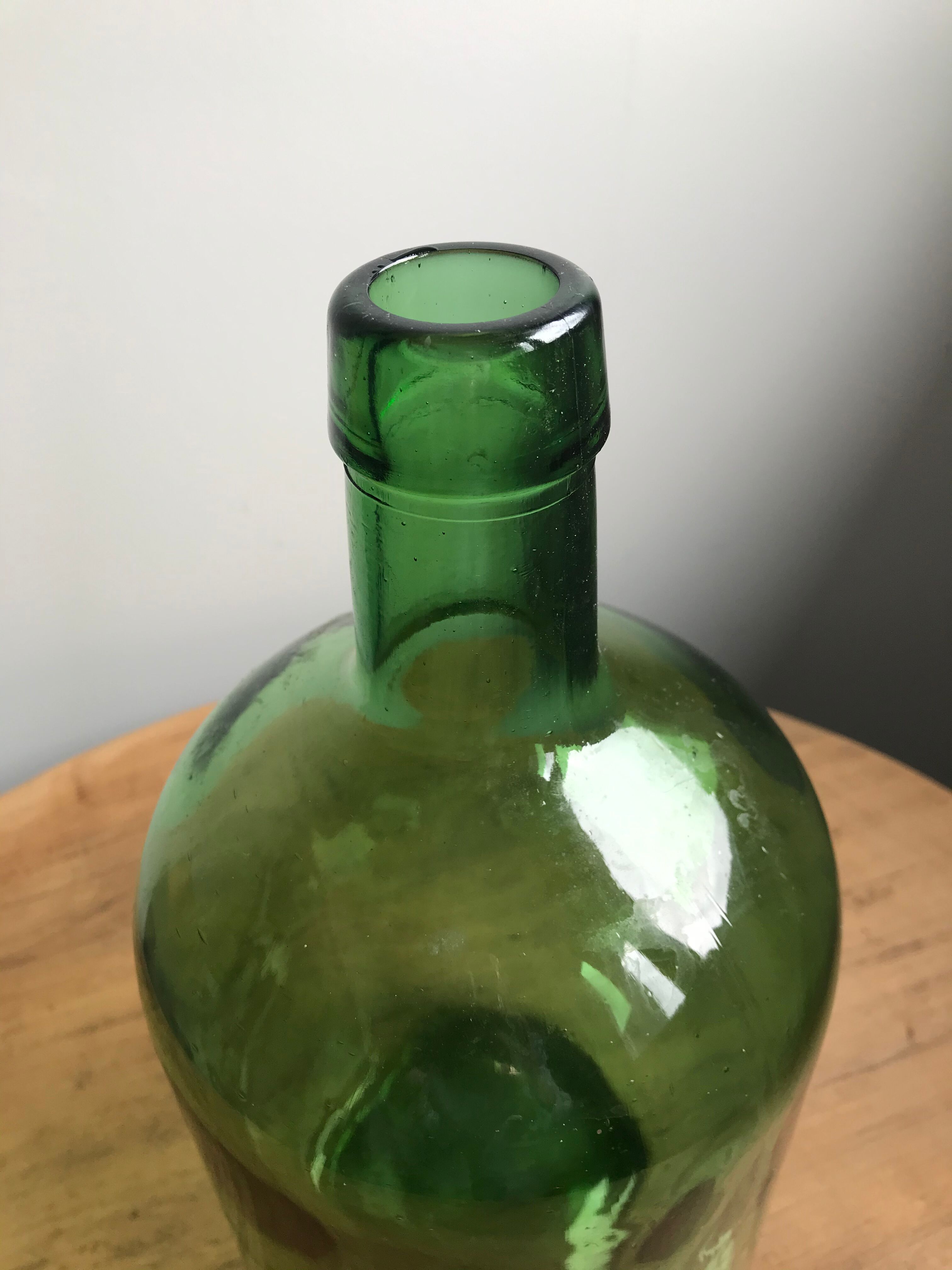 Demijohn canister