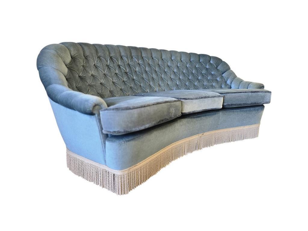 Light blue vintage sofa / armchair with fringes