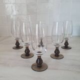 Champagne flutes with smoked brown glass feet