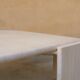 Table basse vintage en travertin par les éditions Roche Bobois