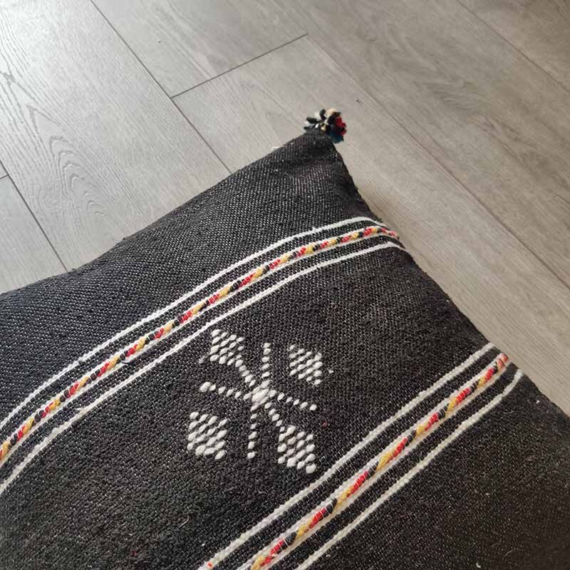 Berber-pom cushion in cotton pompom