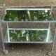 Vintage rolling bar from the 1970s in chrome metal and mirror.