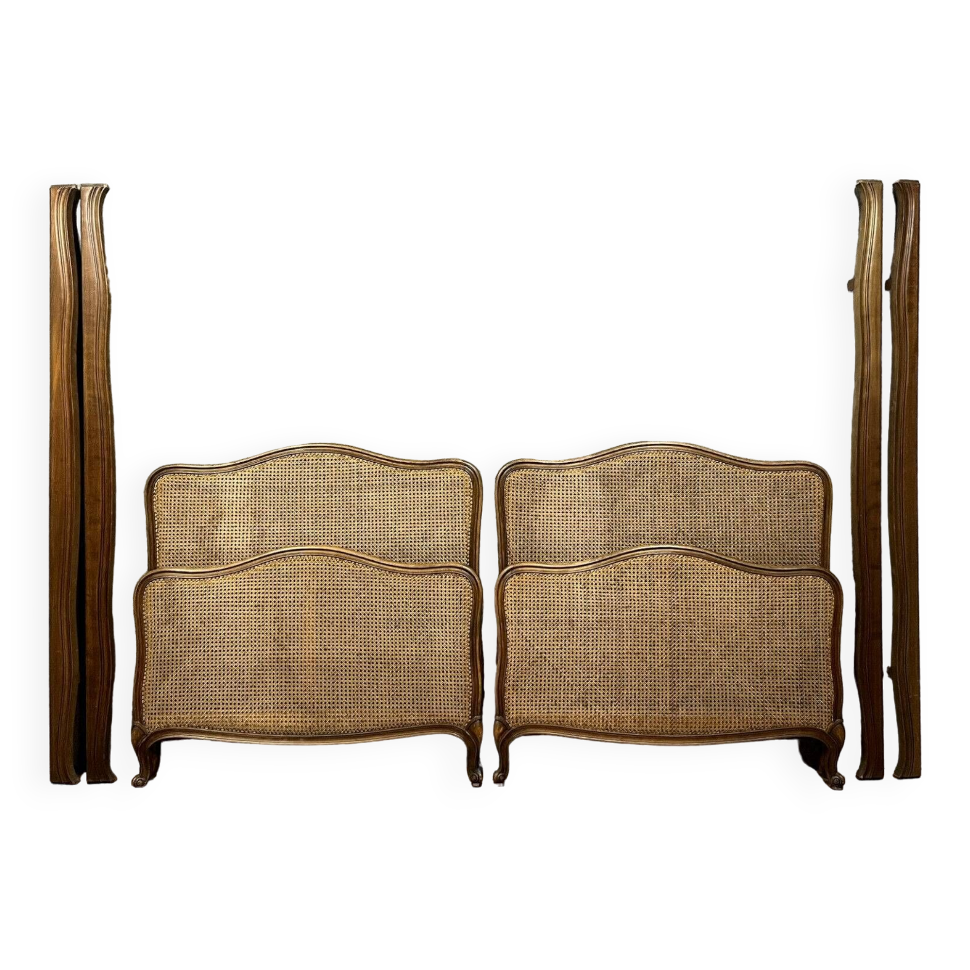 Pair of Louis XV style center beds in walnut and cane base circa 1900