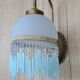 Blue wall lamp with pearl fringes