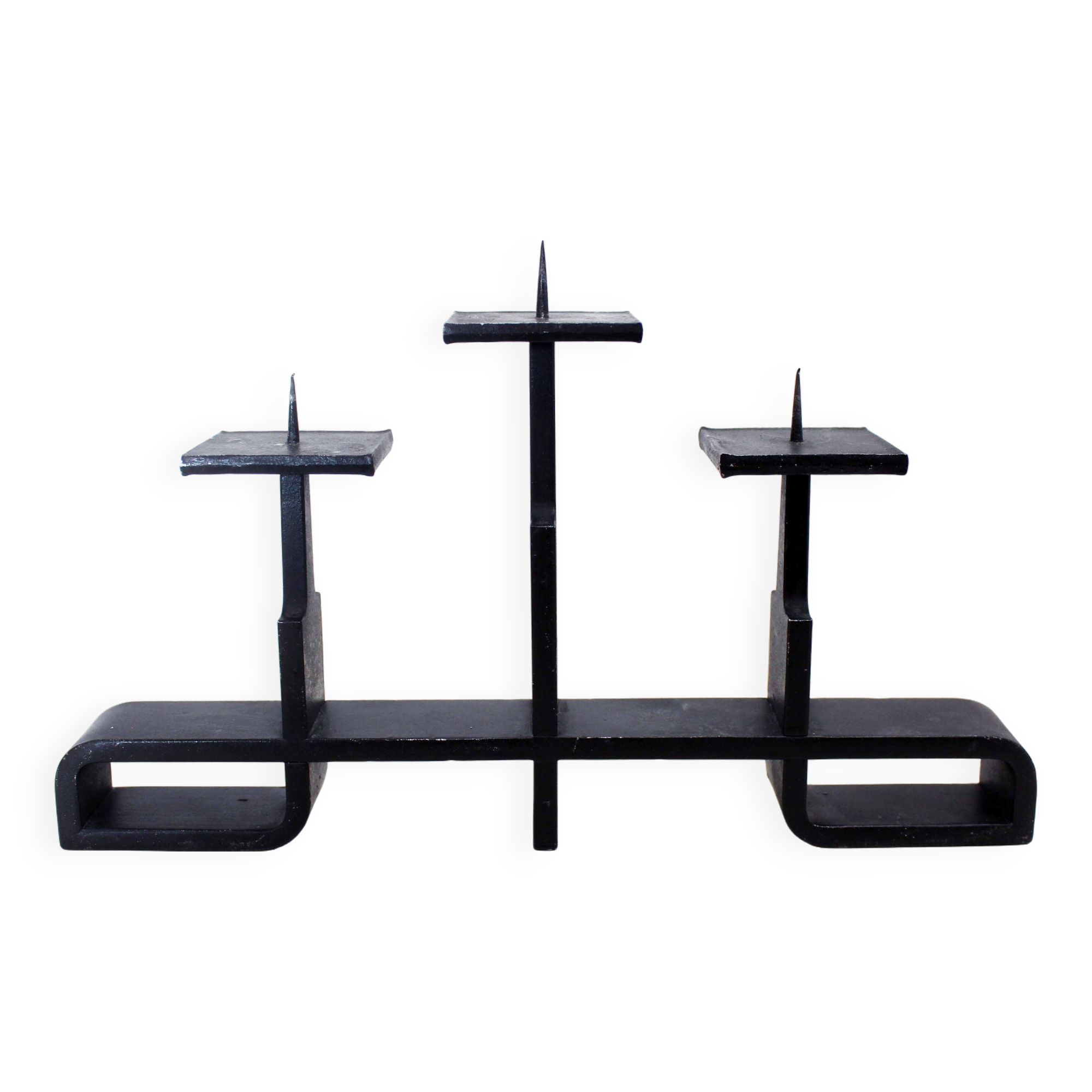 Modernist cast iron candle holder