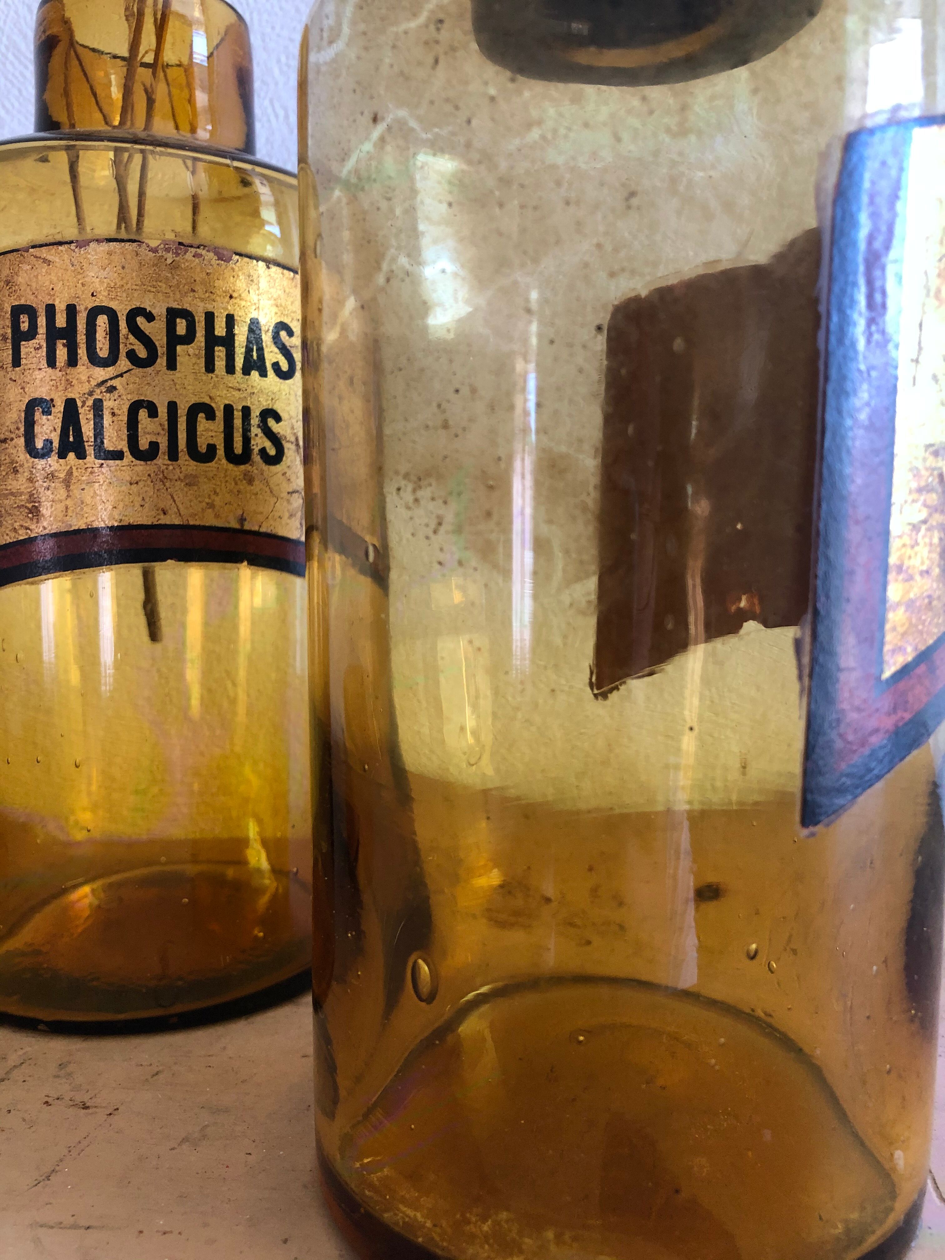 Lots of old brown glass pharmacy jars bottles