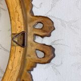 Oval frame with gilded pediments 19th wood and stucco