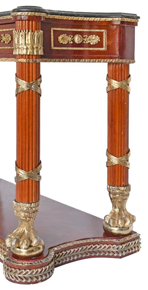 Console topped with an Empire-style mirror.