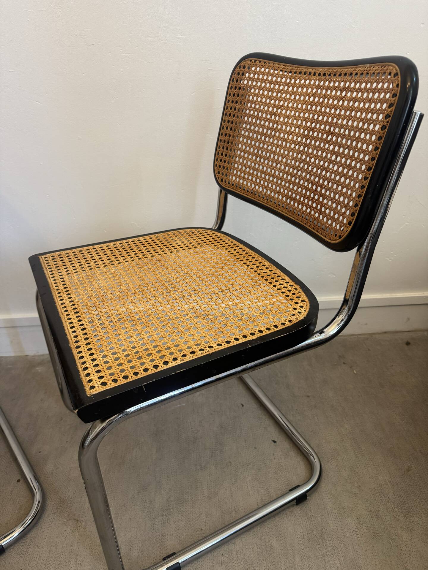 Pair of black Cesca chairs by Marcel Breuer