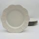 6 flat plates made of Limoges porcelain.