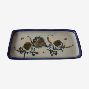 Sandstone cake dish with a fish decoration