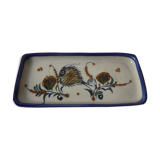 Sandstone cake dish with a fish decoration