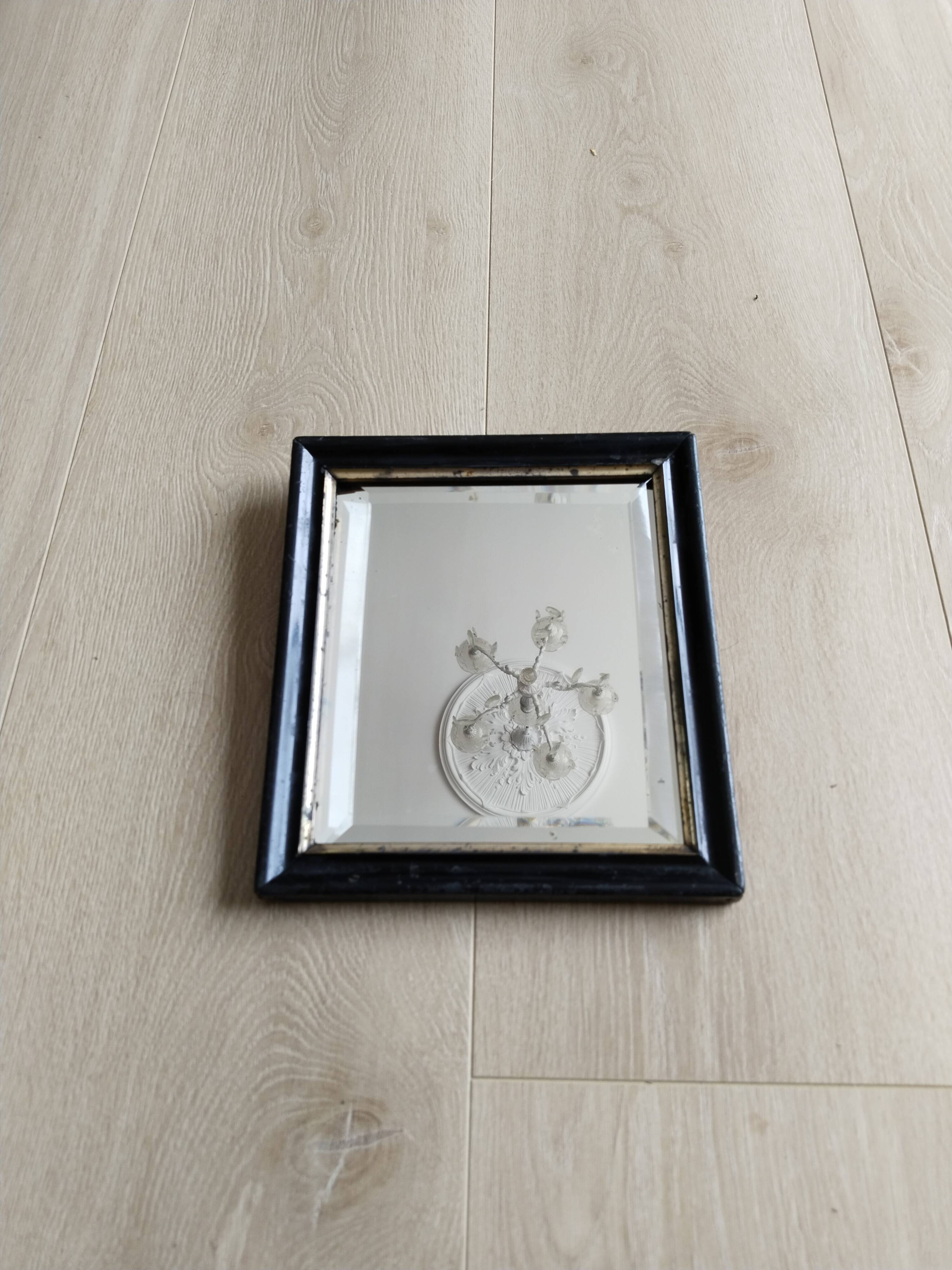 Antique Napoleon III beveled mirror, black and gold