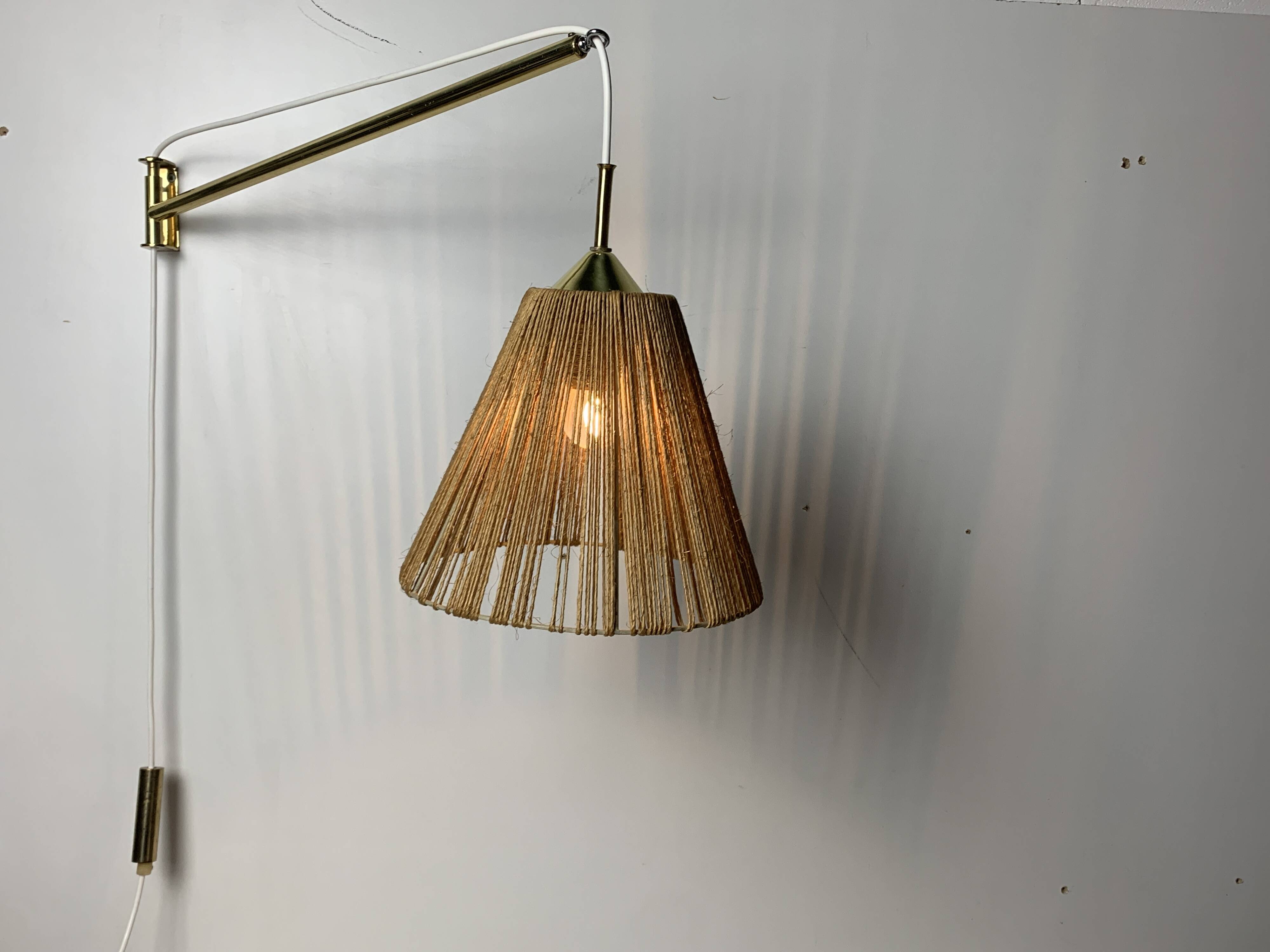 Midcentury extendable brass wall mount with cocoon and sisal shade Lars Schioler, 1960s