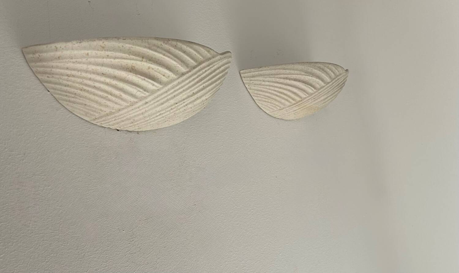 Pair of vintage speckled beige plaster wall lights, France 1970s