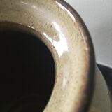 Glazed stoneware ball vase decorated with flowers