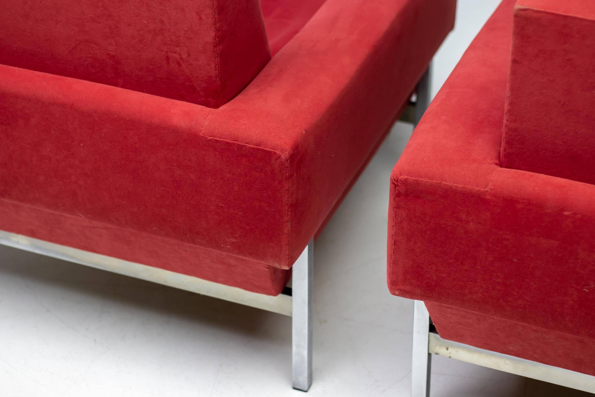 Red Kiushu armchairs by Saporiti characteristic of mid-20th century Italian modern design.