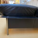 Pair of black leather sofas produced by Poltrona Frau, circa 1980/1990.