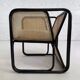 Cubic armchair in black rattan and canework