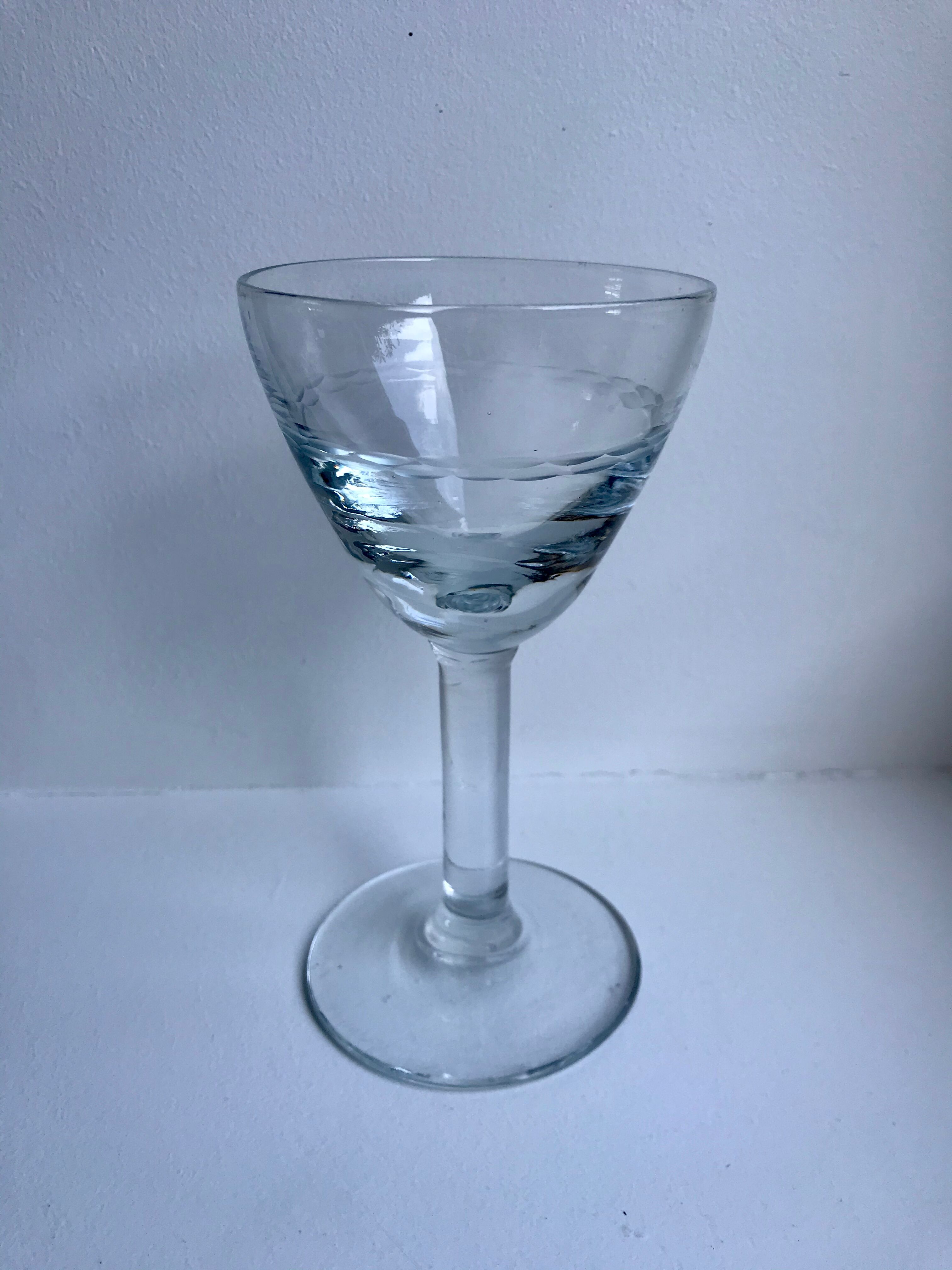 Set of 11 molded glass wine glasses engraved 20s