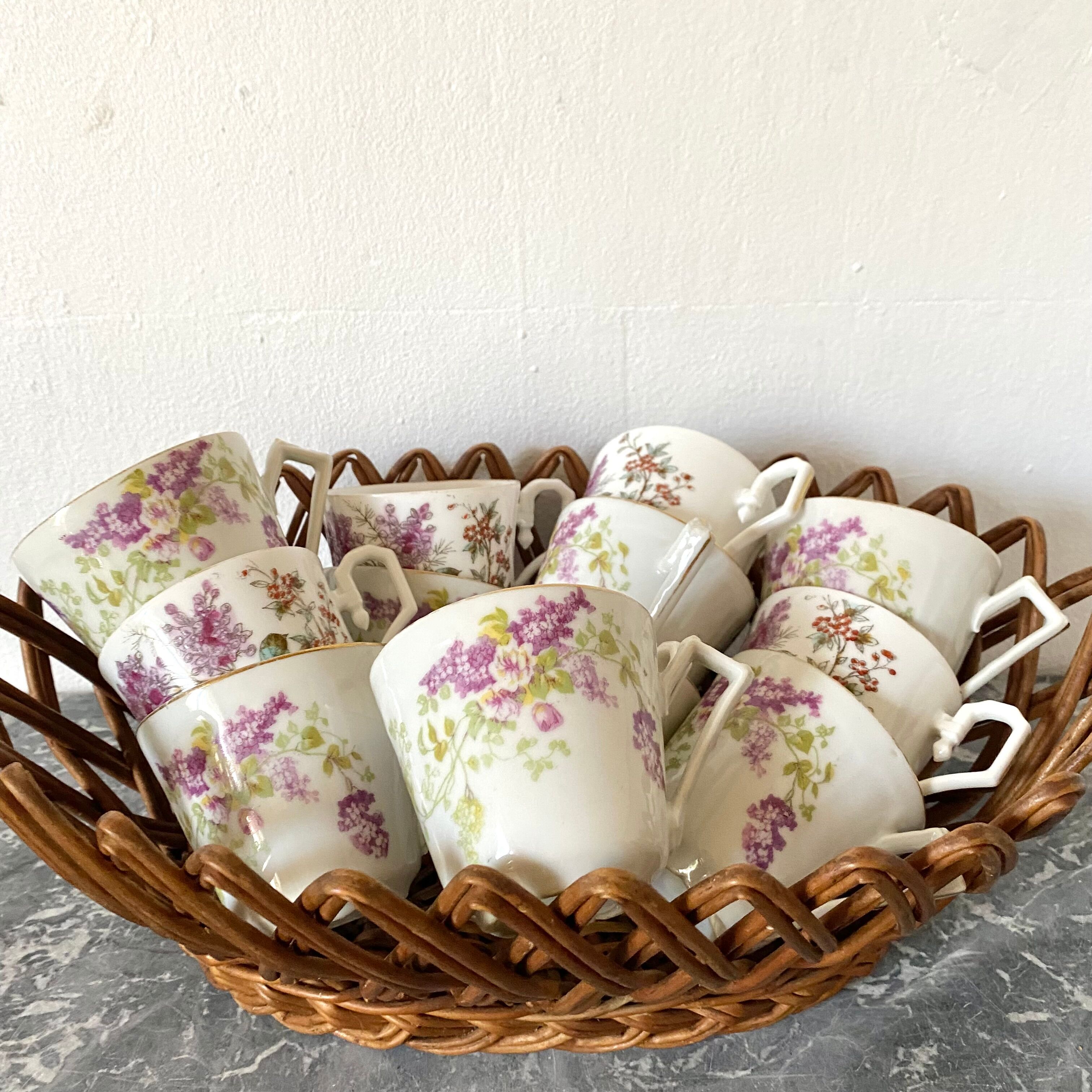 Antique flowered porcelain cups mismatched