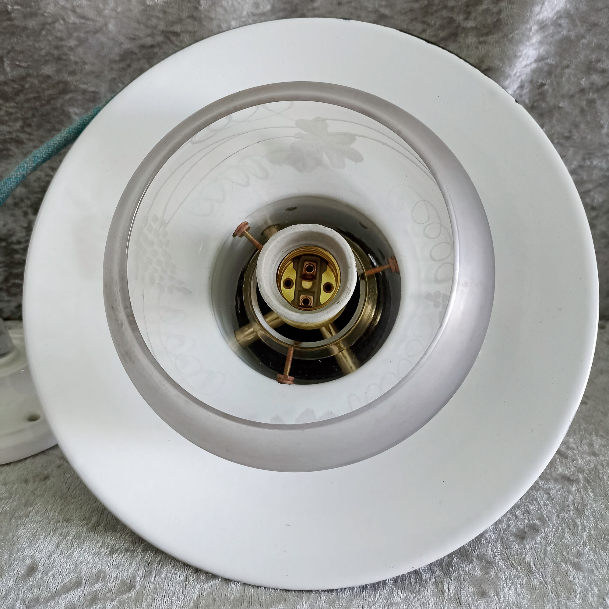 Old enamelled sheet metal suspension with glass cup