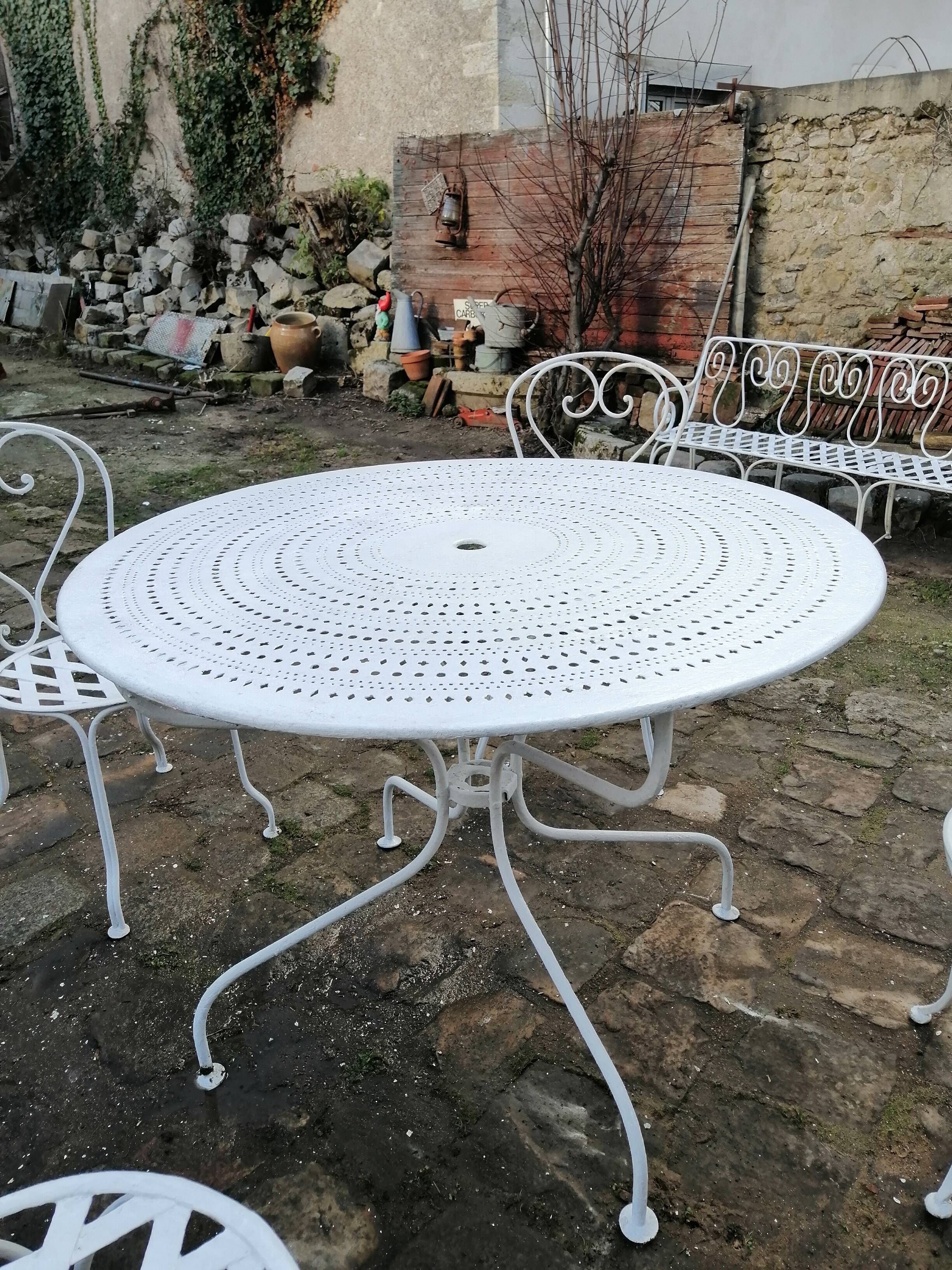Antique wrought iron garden furniture