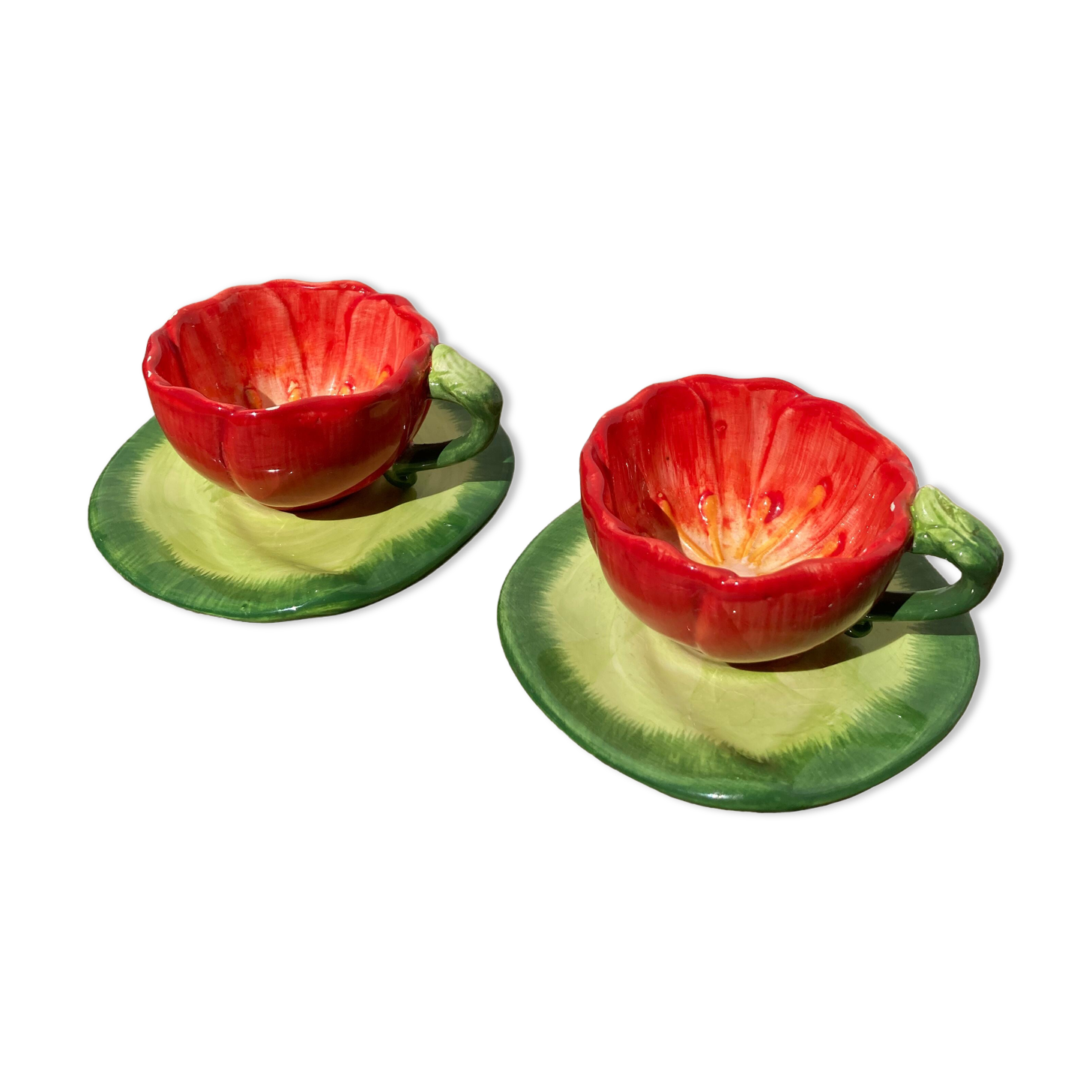 2 coffee cups red flowers and leaf in slurry shepherd