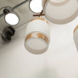 Scandinavian triangle pendant light in cascade with 3 opalines