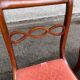 4 dining chairs made of solid wood and pink velvet fabric from the 1950s.