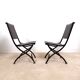 Ensemble de 2 chaises pliantes anciennes en fer forgé et cuir