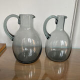 Set of two Daum pitchers in smoked crystal