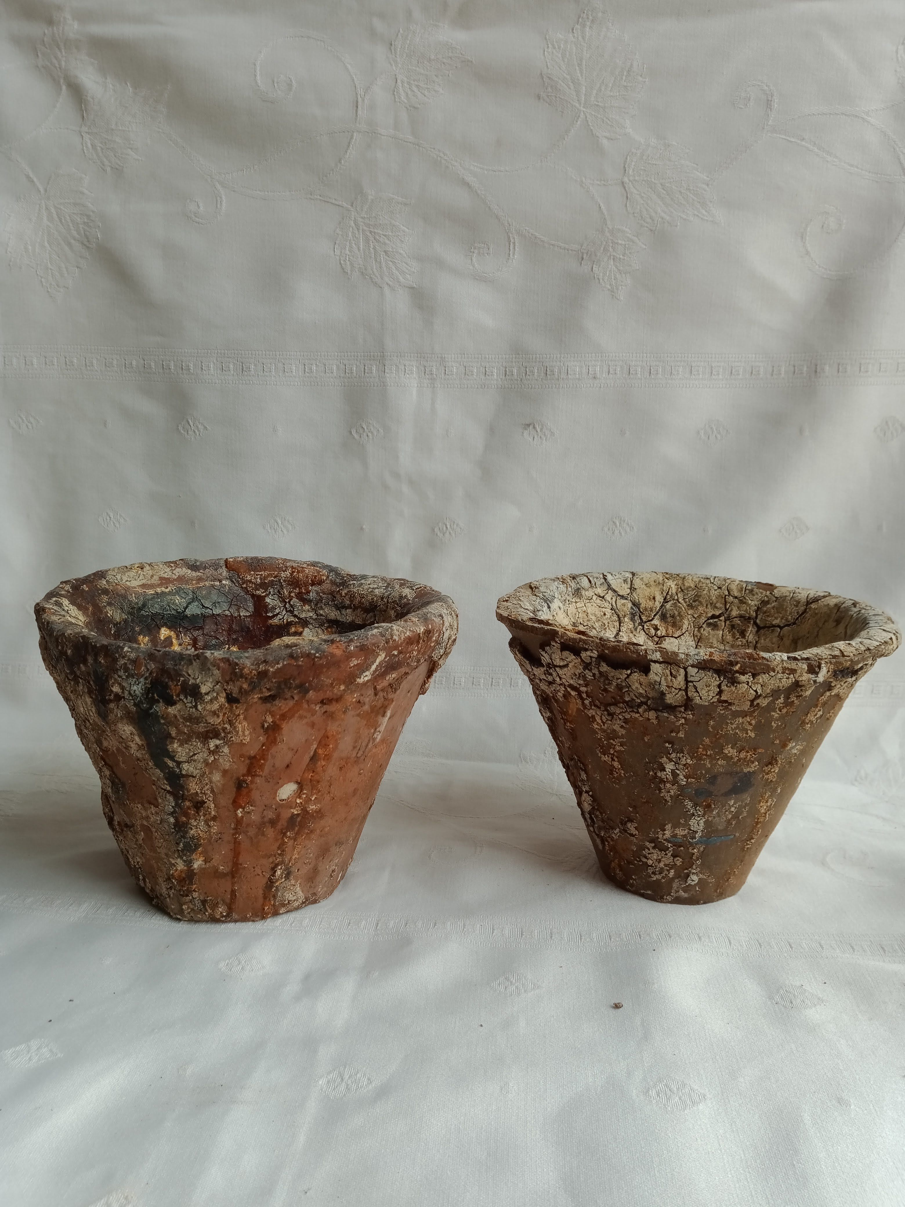 Old terracotta sap pots