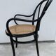 Fauteuil Thonet modèle 1018 en bois courbé noir et cannage 1930