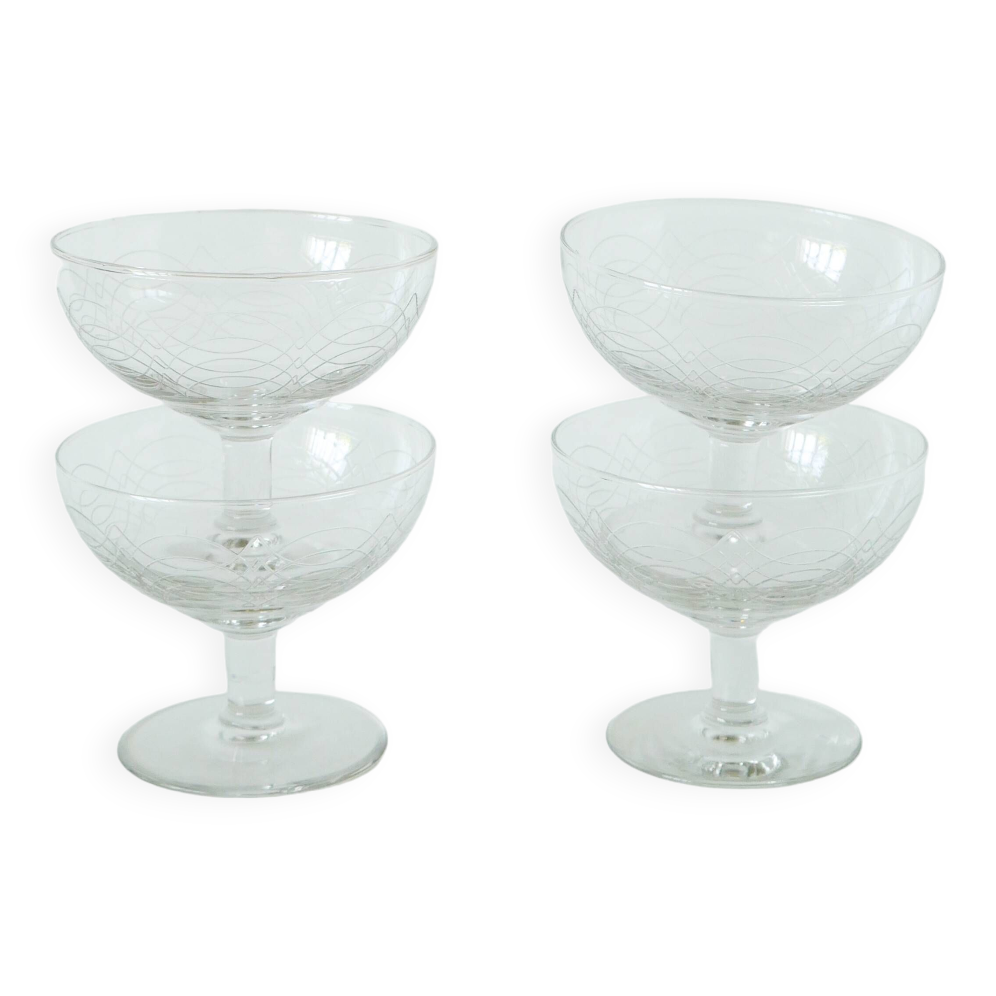 Set of 4 engraved crystal champagne glasses, arabesque motifs, 1950