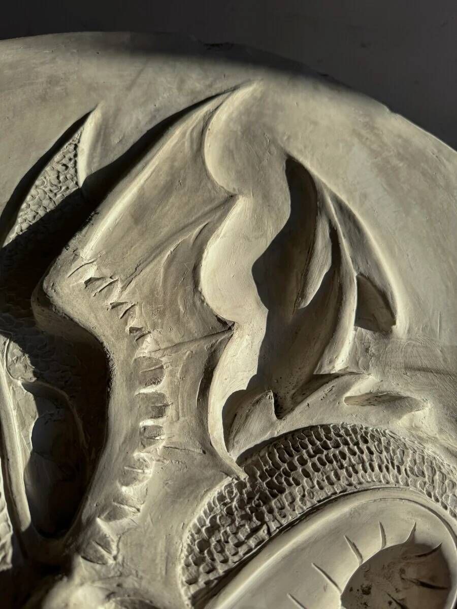 Plaster dragon by Walter De Buck