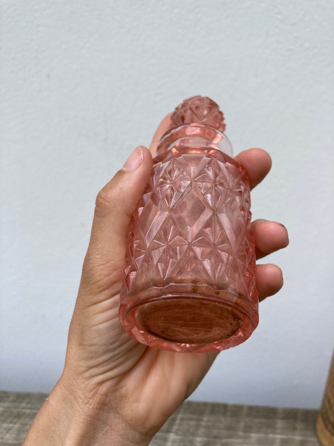 Art Deco perfume bottle in old amber pink glass