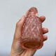 Art Deco perfume bottle in old amber pink glass