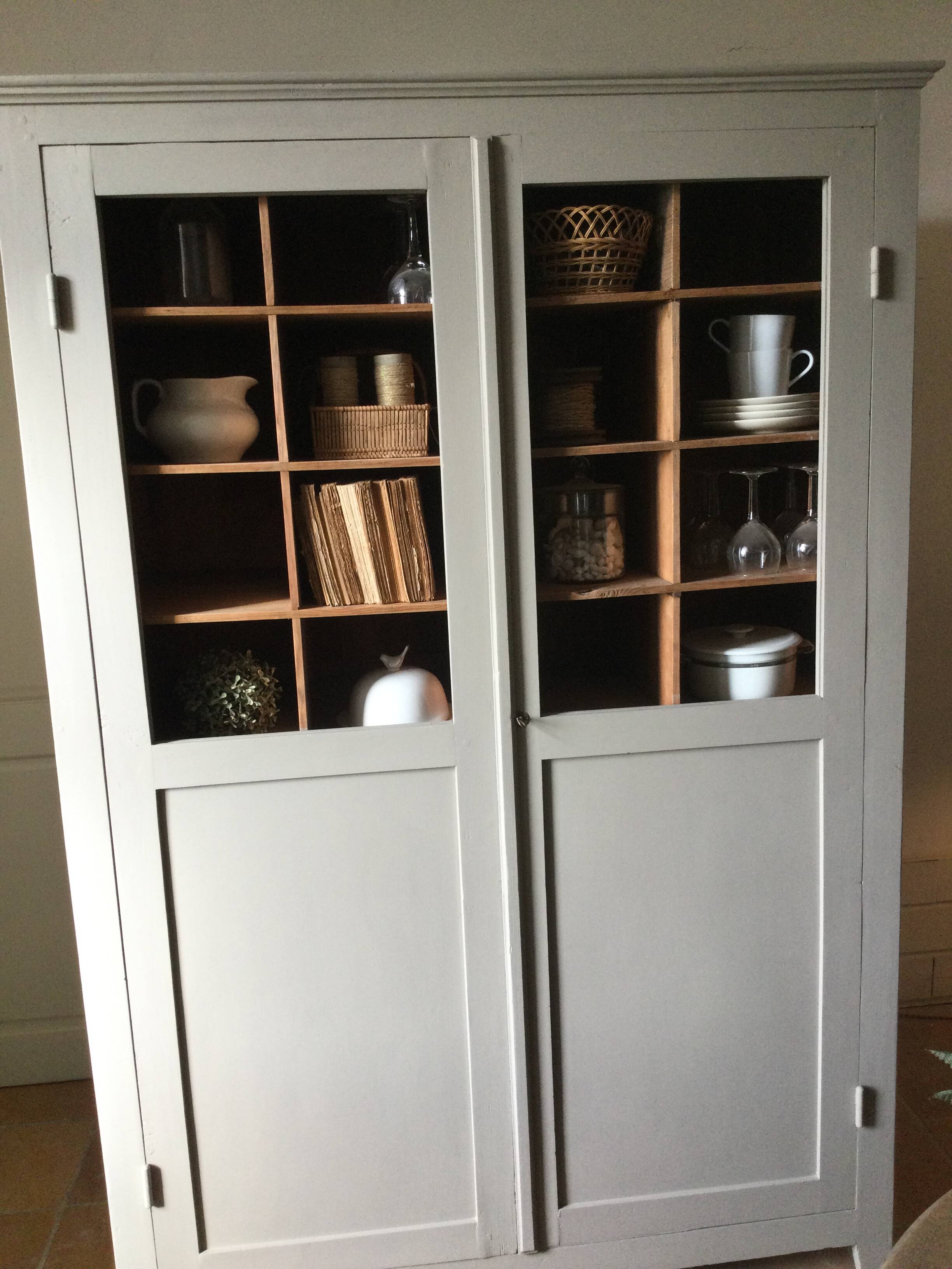 Antique Parisian wardrobe with interior compartments.