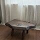 Coffee table in solid wood with organic shape