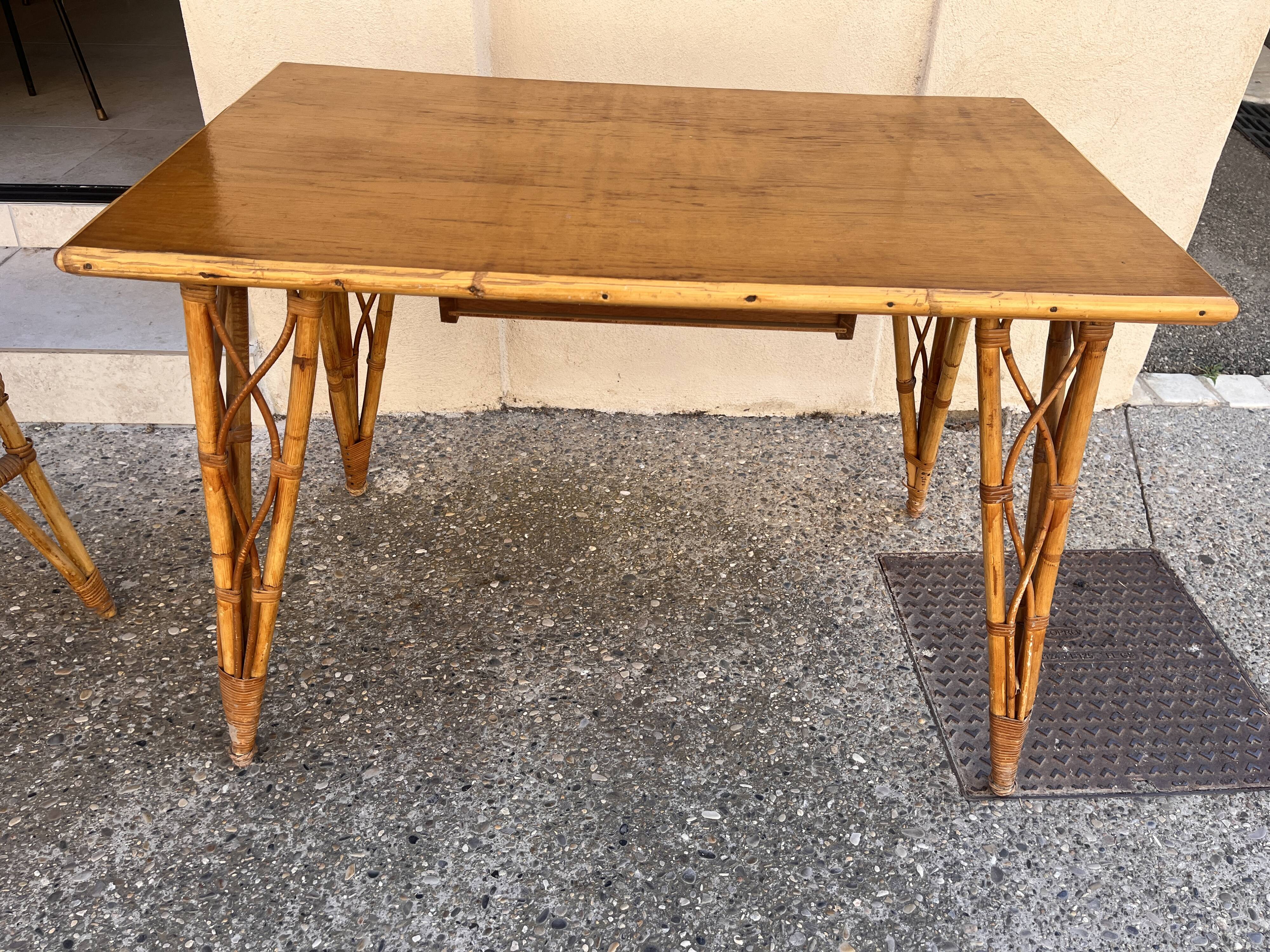 vintage 1960s rattan desk with Eiffel Tower legs