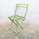 Child's folding chair in patinated green wood
