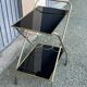 Vintage gold dessert bar with two black trays.