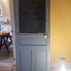Large painted oak interior door with its hinges