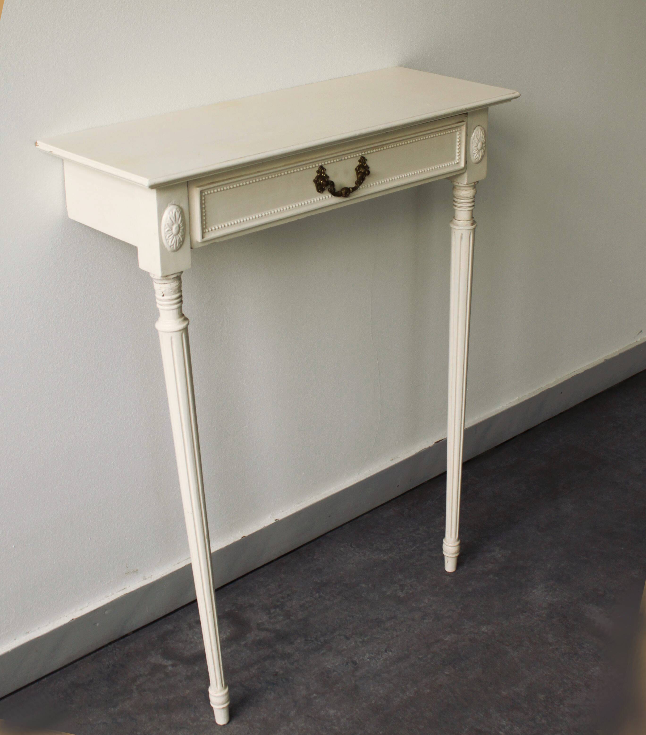 Two-legged wall console in Louis XVI style, painted wood.