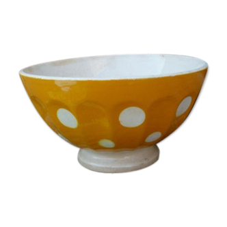 Old yellow ceramic coffee bowl with white polka dots