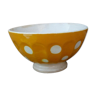 Old yellow ceramic coffee bowl with white polka dots