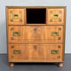 Antique campaign chest / ship’s chest, England, 1940s. Mahogany with a distinctive grain, brass inlays and hardware.