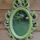 Small green wooden mirror